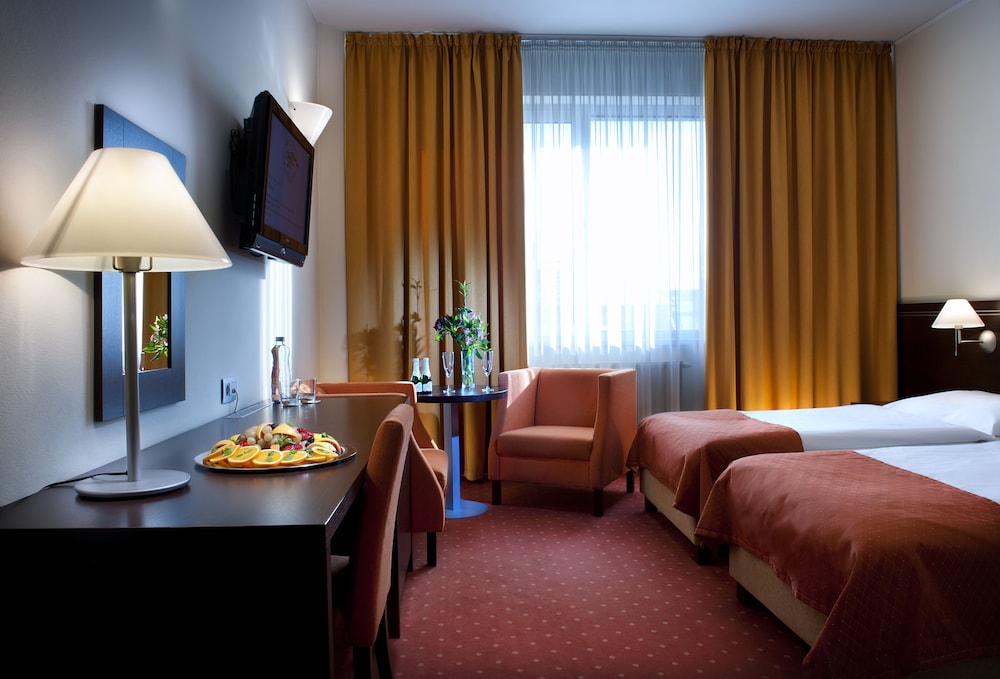 Habitación ejecutiva con 1 cama doble o 2 individuales del hotel Tatra. Foto 2