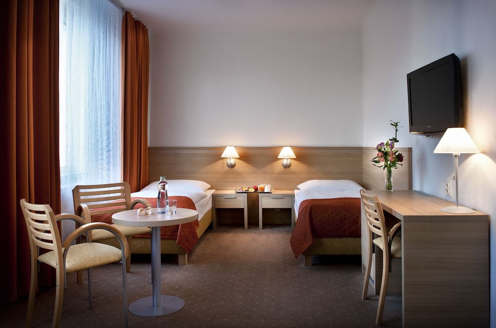 Habitación estándar con 1 cama doble o 2 individuales del hotel Tatra. Foto 1