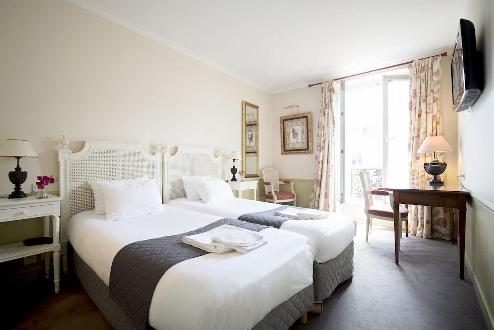 Habitación superior del hotel France Louvre. Foto 1