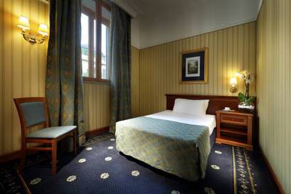 Habitación Doble Económica con 1 cama pequeña del hotel Exe International Palace. Foto 1