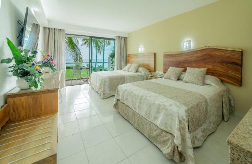 Habitación Doble Superior - 2 camas dobles del hotel Posada Real Puerto Escondido