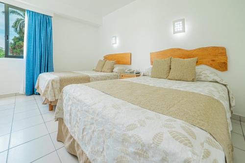Habitación Doble Estándar con vistas al jardín del hotel Posada Real Puerto Escondido
