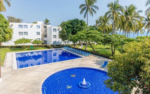 Habitación Doble Estándar con vistas al jardín del hotel Posada Real Puerto Escondido. Foto 5