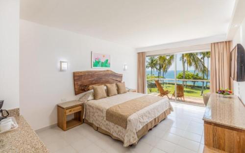 Deluxe King Room with Frontal Sea View del hotel Posada Real Puerto Escondido. Foto 1