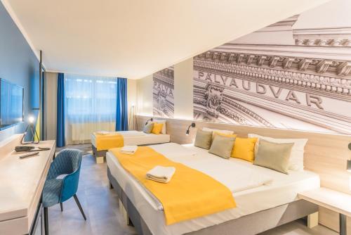 Habitación Triple Confort del hotel Impulso by Mellow Mood Hotels. Foto 1