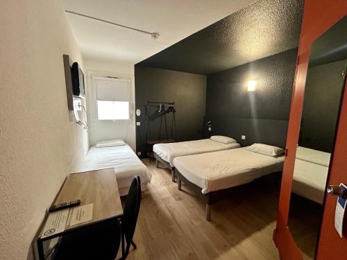 Habitación Estándar - 3 camas individuales del hotel Ibis Budget Agen