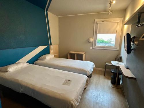 Habitación Estándar - 2 camas individuales del hotel Ibis Budget Agen. Foto 1