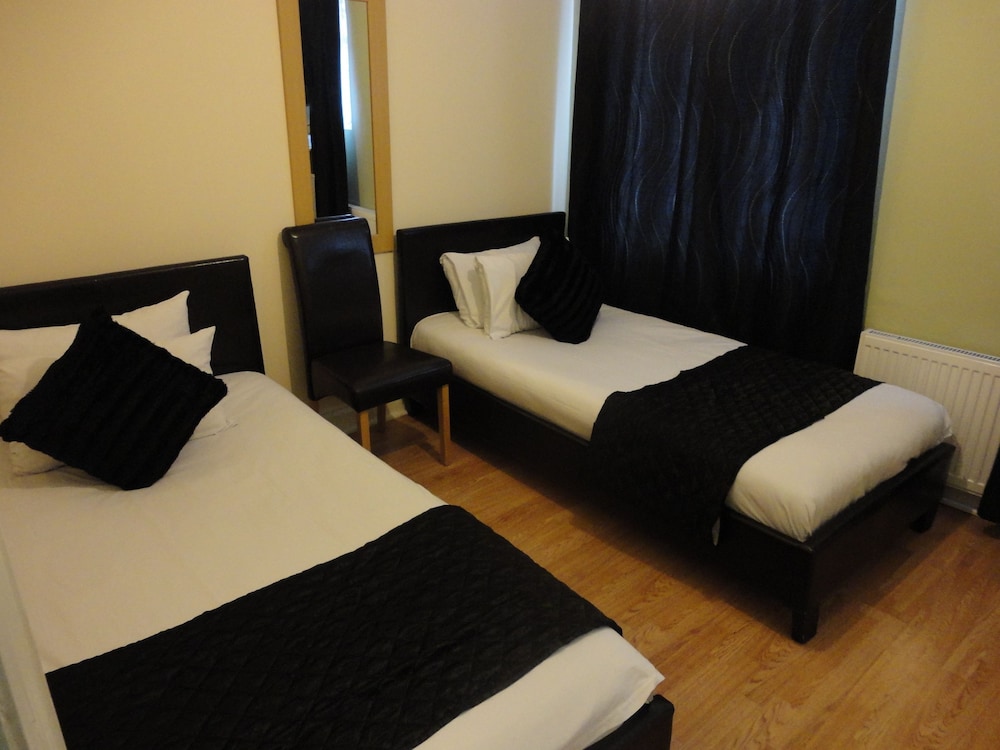 Habitación económica con 2 camas individuales del hotel City View Roman Road Market. Foto 1