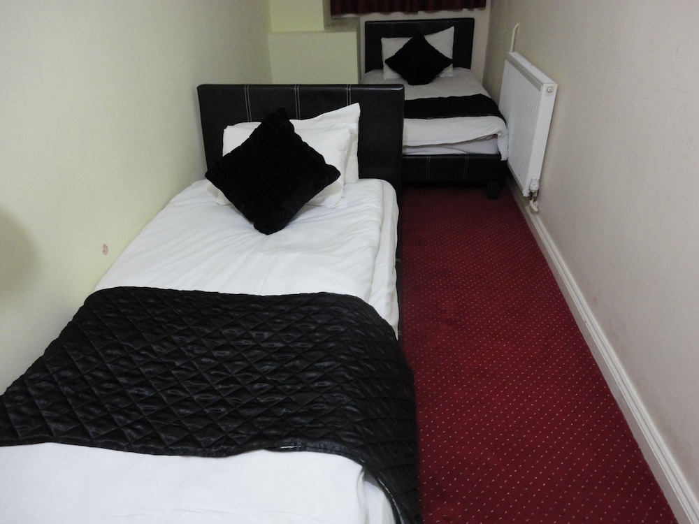 Habitación económica con 2 camas individuales del hotel City View Roman Road Market. Foto 2