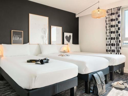 Habitación Triple Estándar del hotel Ibis Styles Gare De L'Est Chateau Landon. Foto 3