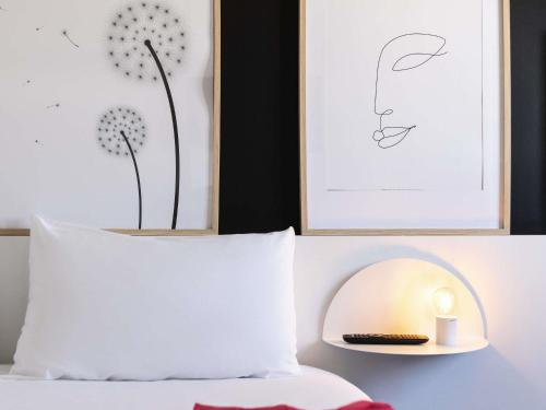 Habitación triple estándar con cama doble y cama individual del hotel Ibis Styles Gare De L'Est Chateau Landon