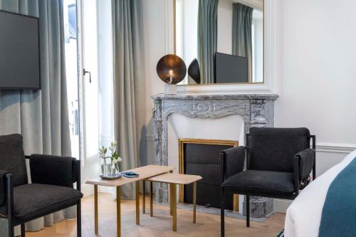 Habitación Triple Prestige del hotel Louvre Montana. Foto 9