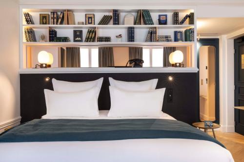 Habitación Triple Prestige del hotel Louvre Montana. Foto 10