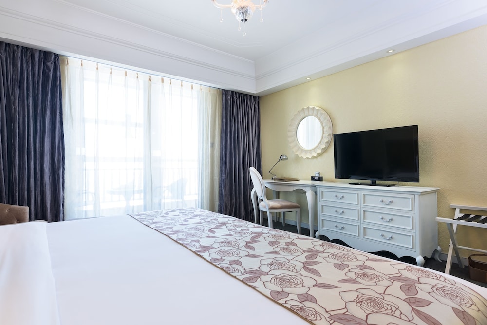 Habitación Deluxe con 1 cama king size del hotel Mercure Xiamen Exhibition Centre. Foto 2