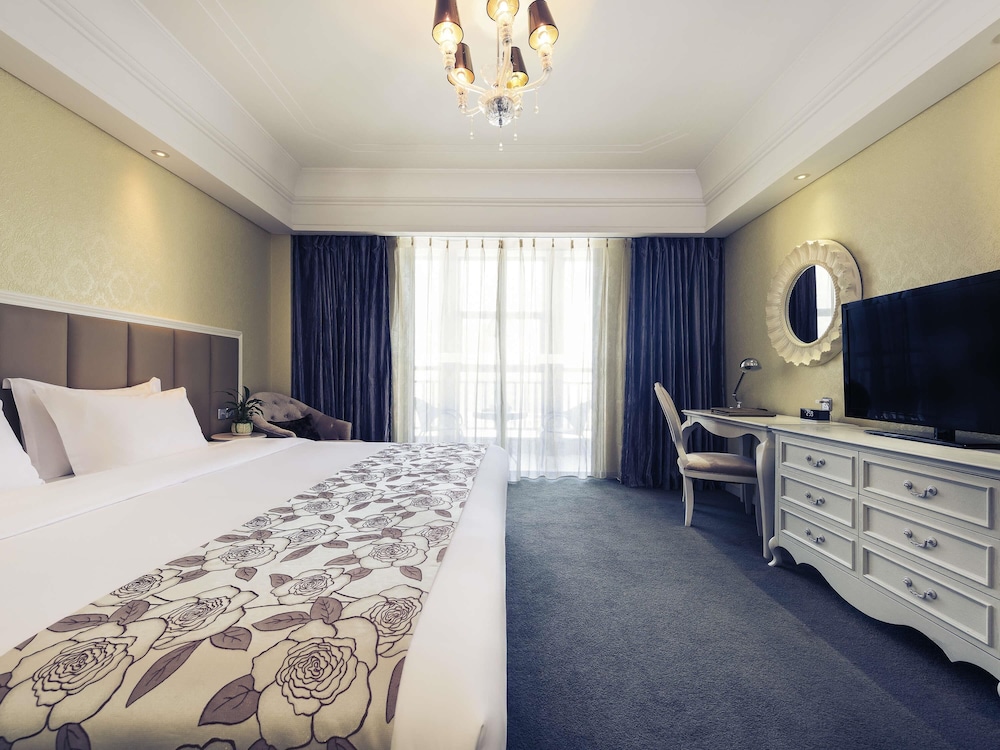 Habitación Deluxe con 1 cama king size del hotel Mercure Xiamen Exhibition Centre. Foto 4