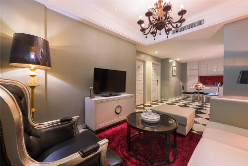 Suite Deluxe con 1 cama King Size del hotel Mercure Xiamen Exhibition Centre. Foto 3