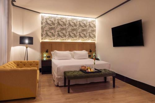 Habitación Superior del hotel H10 Puerta De Alcalá. Foto 4