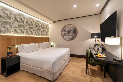 Habitación Doble Deluxe con terraza del hotel H10 Puerta De Alcalá
