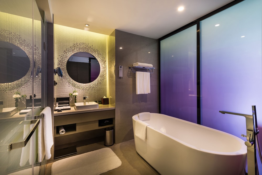 Habitación Executive con 2 camas individuales del hotel Pullman Nanjing Lukou Airport. Foto 6