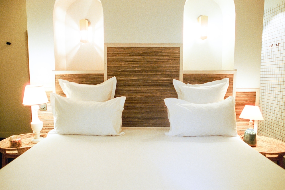 Habitación superior con 2 camas individuales del hotel Habituel. Foto 1
