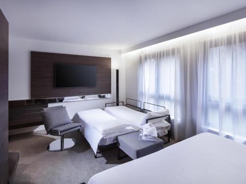 Suite Superior con 2 camas individuales del hotel Novotel Suites Colmar Centre. Foto 2