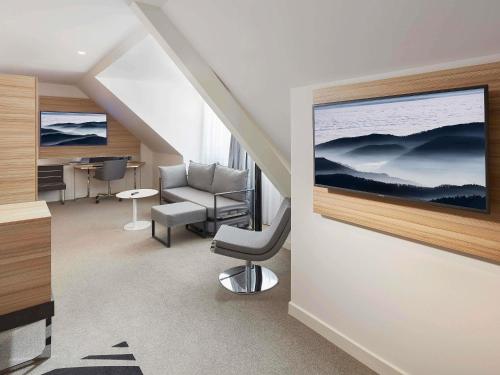 Suite Executive con cama grande del hotel Novotel Suites Colmar Centre. Foto 3