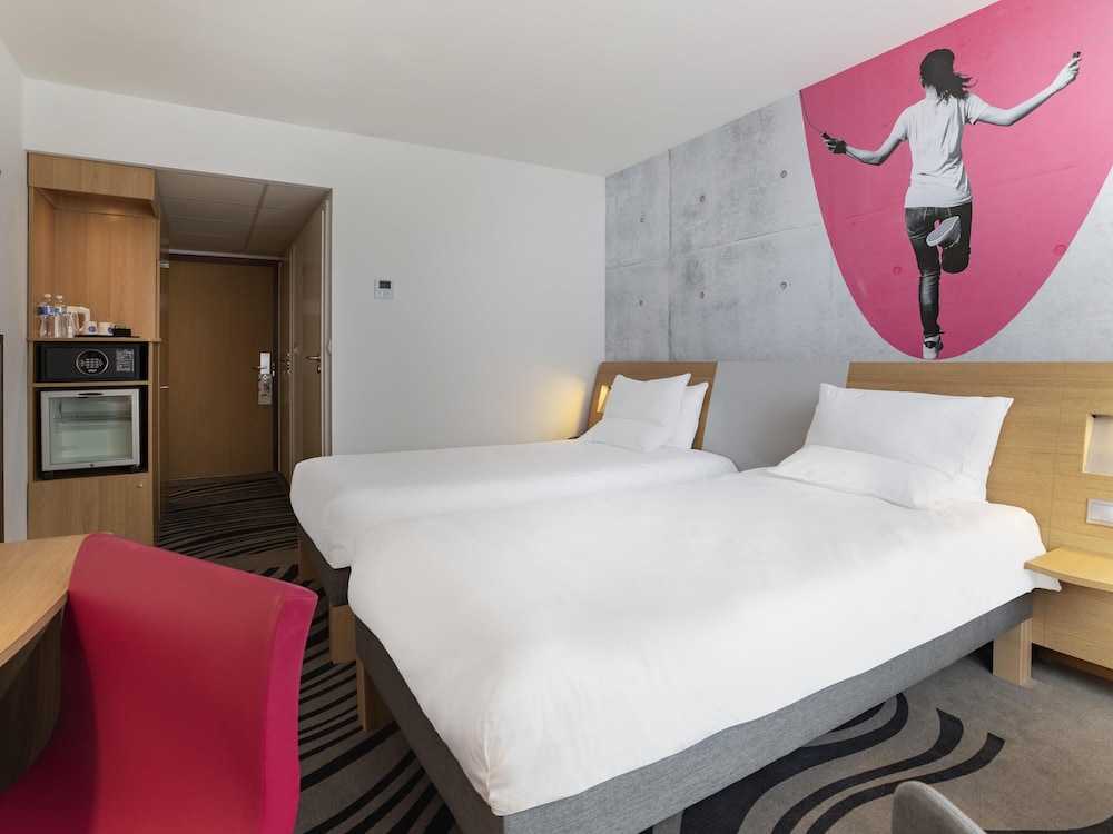 Habitación Superior Cómoda con camas individuales del hotel Novotel Wroclaw City. Foto 3