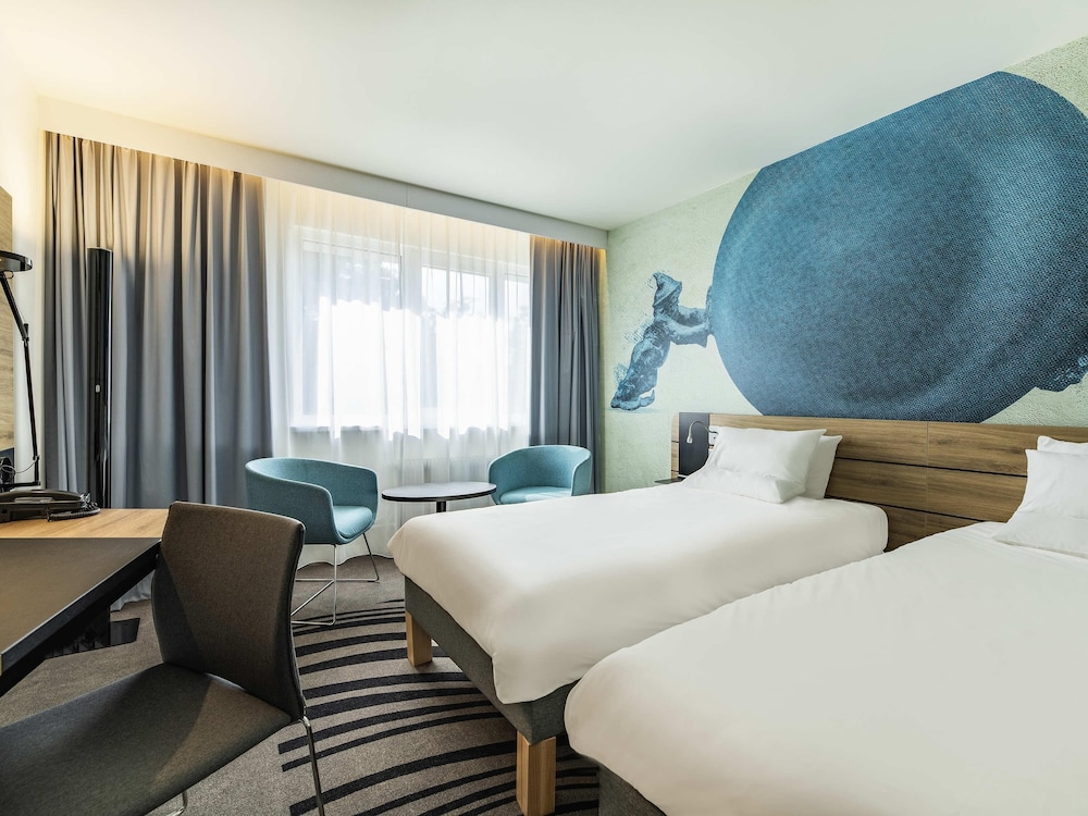 Habitación Superior Cómoda con camas individuales del hotel Novotel Wroclaw City. Foto 5