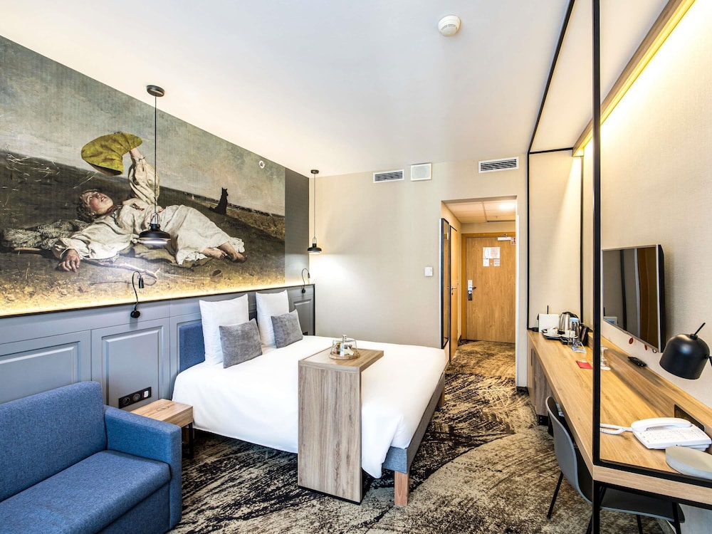 Habitación Privilege - Recién renovada, 1 cama doble, sofá, vistas a la ciudad del hotel Mercure Wroclaw Centrum. Foto 6