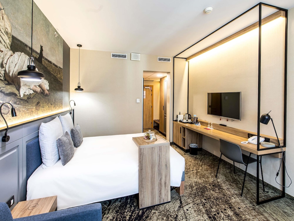 Habitación Privilege - Recién renovada, 1 cama doble, sofá, vistas a la ciudad del hotel Mercure Wroclaw Centrum. Foto 8