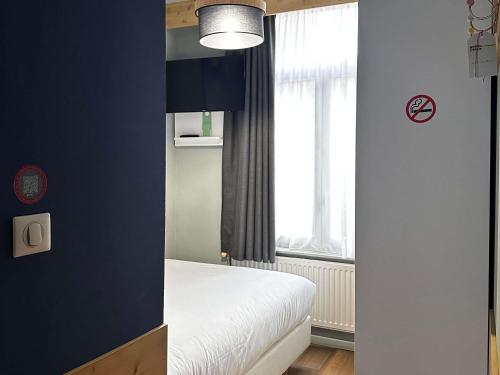 Habitación individual Pop con 1 cama individual grande del hotel Greet hotel Lille Gare Flandres. Foto 3