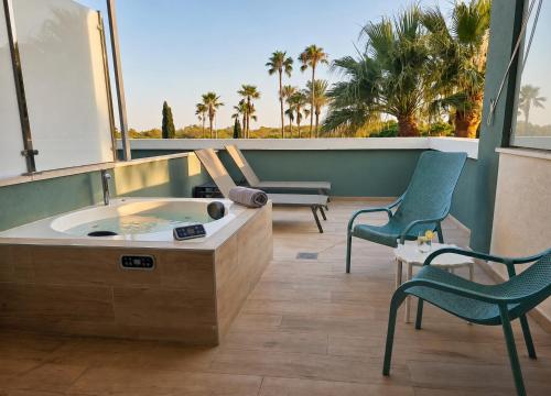 Habitación Doble con bañera de hidromasaje del hotel Smy Isla Cristina. Foto 1