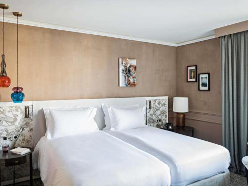 Habitación Individual de lujo con vistas al patio o a la Rue Scribe - 2 camas individuales del hotel Sofitel Le Scribe Paris Opéra