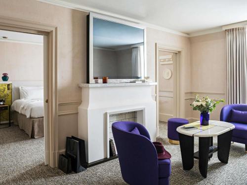 Suite Prestige con sofá cama, salón independiente y vistas al bulevar o a la calle Scribe - 1 cama extragrande del hotel Sofitel Le Scribe Paris Opéra