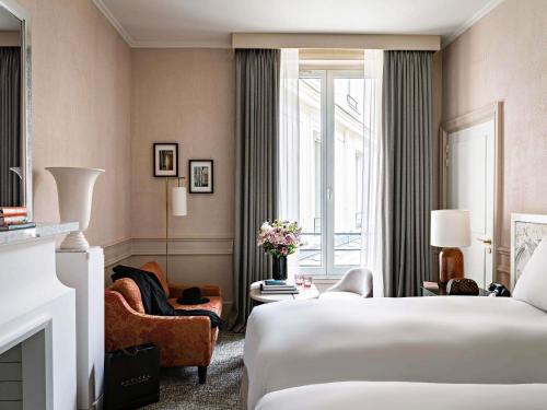 Habitación Individual de lujo con vistas al patio o a la Rue Scribe - 2 camas individuales del hotel Sofitel Le Scribe Paris Opéra. Foto 7