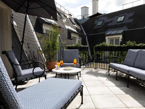Suite Prestige con salón y terraza - 1 cama extragrande - 6.ª planta del hotel Sofitel Le Scribe Paris Opéra. Foto 3