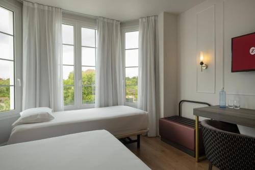 Habitación Triple del hotel Exe Zarzuela Park. Foto 3