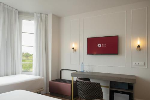 Habitación Triple del hotel Exe Zarzuela Park. Foto 4
