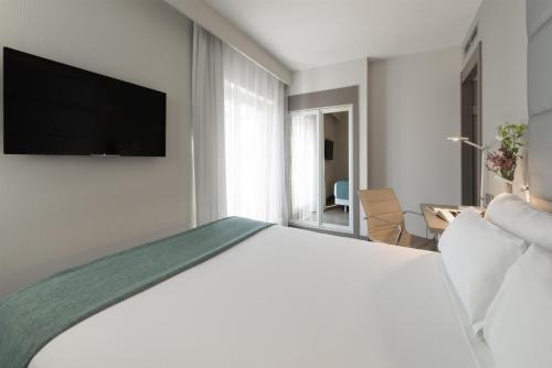 Habitaciones Familiares comunicadas del hotel Nh Madrid Zurbano. Foto 2