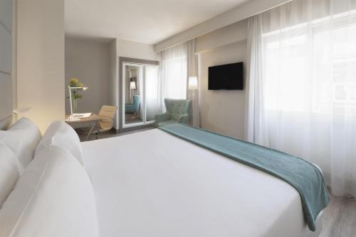 Habitaciones Familiares comunicadas del hotel Nh Madrid Zurbano. Foto 3