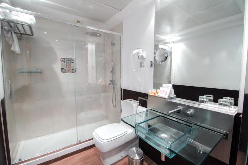 Habitación Doble del hotel Petit Palace Marques Santa Ana. Foto 9