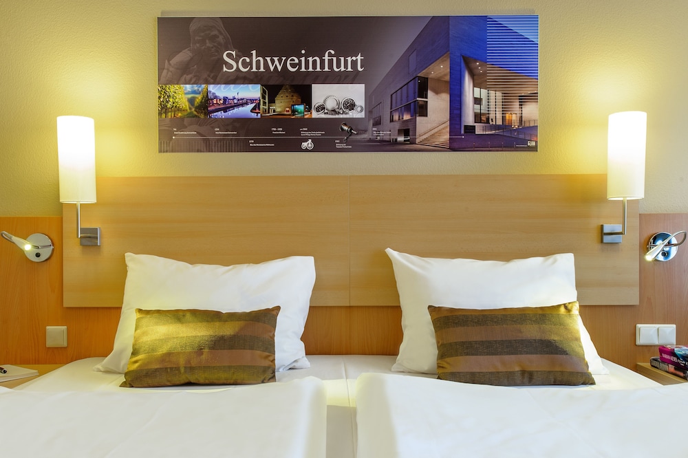 Habitación superior con 1 cama king - size y vistas al río Main del hotel Mercure Schweinfurt Maininsel. Foto 1