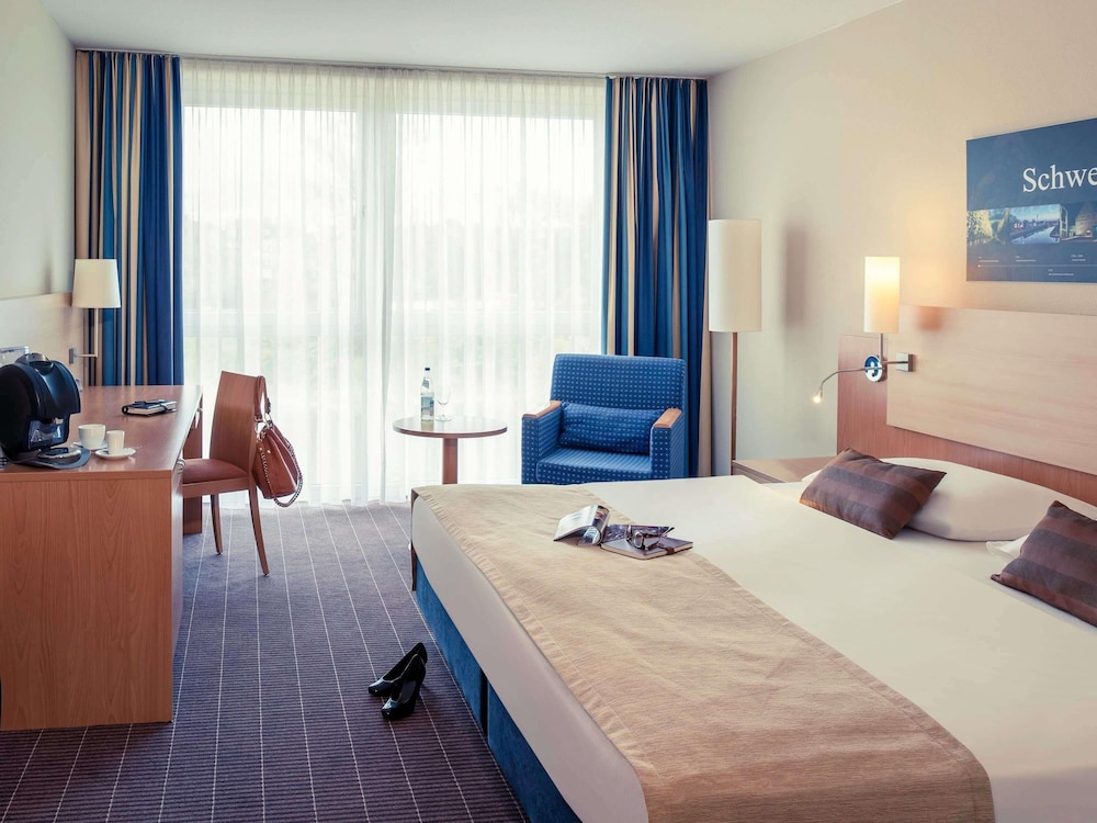 Habitación superior con 1 cama king - size y vistas al jardín del hotel Mercure Schweinfurt Maininsel