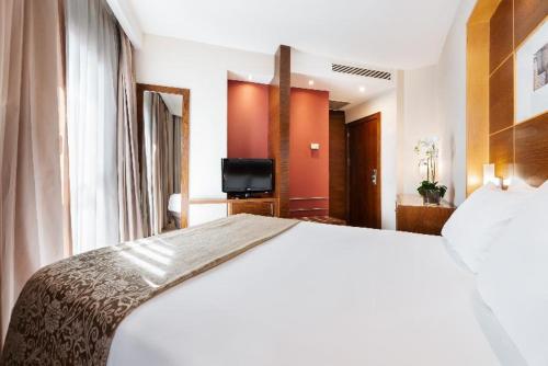 Habitación Individual del hotel Exe León. Foto 1