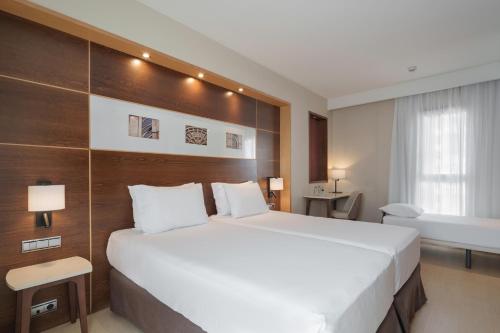 Habitación Doble con Cama supletoria del hotel Dorma León