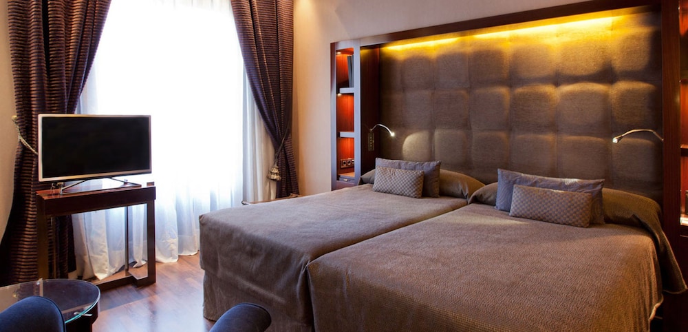 Habitación familiar, 2 habitaciones (Deluxe) del hotel Casa Fuster. Foto 1