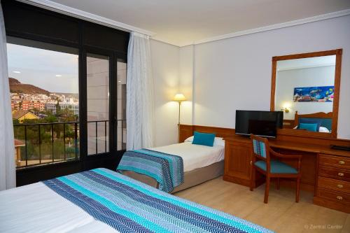 Habitación Triple del hotel Zentral Center. Foto 3