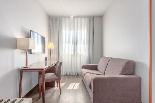 Habitación Doble con zona de estar del hotel Eurostars Toledo