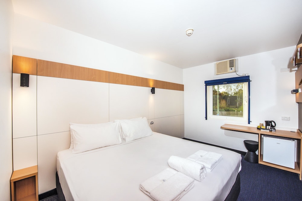 Habitación Estándar con 1 Cama Queen del hotel Ibis Budget Casula Liverpool. Foto 7