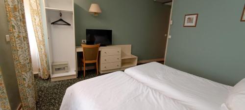 Habitaciones comunicadas del hotel Grand Hotel du Havre. Foto 1